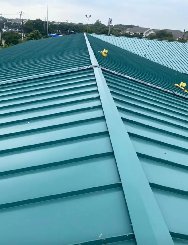 Green commercial metal roof ridge and valley for Metal Roof Repair in Seven Oaks