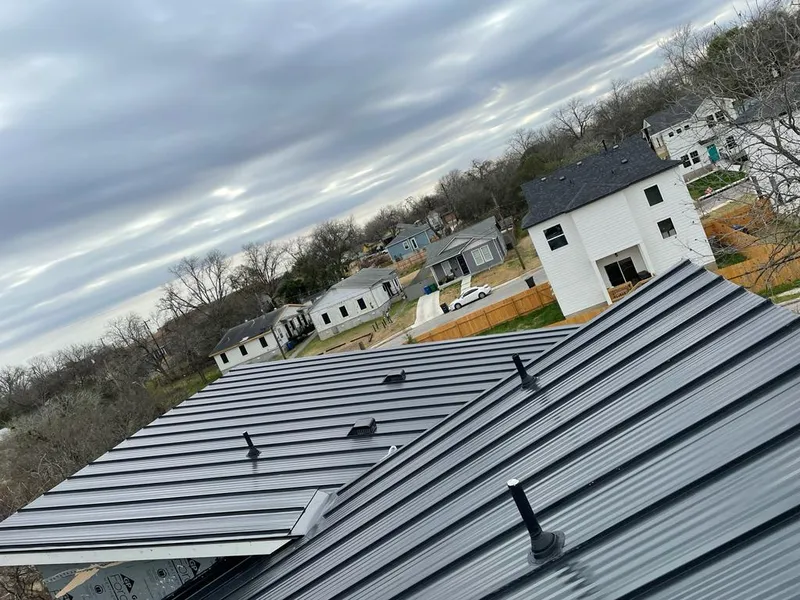 Standing seam metal roof panels with vents for Skylight Repair in Seven Oaks